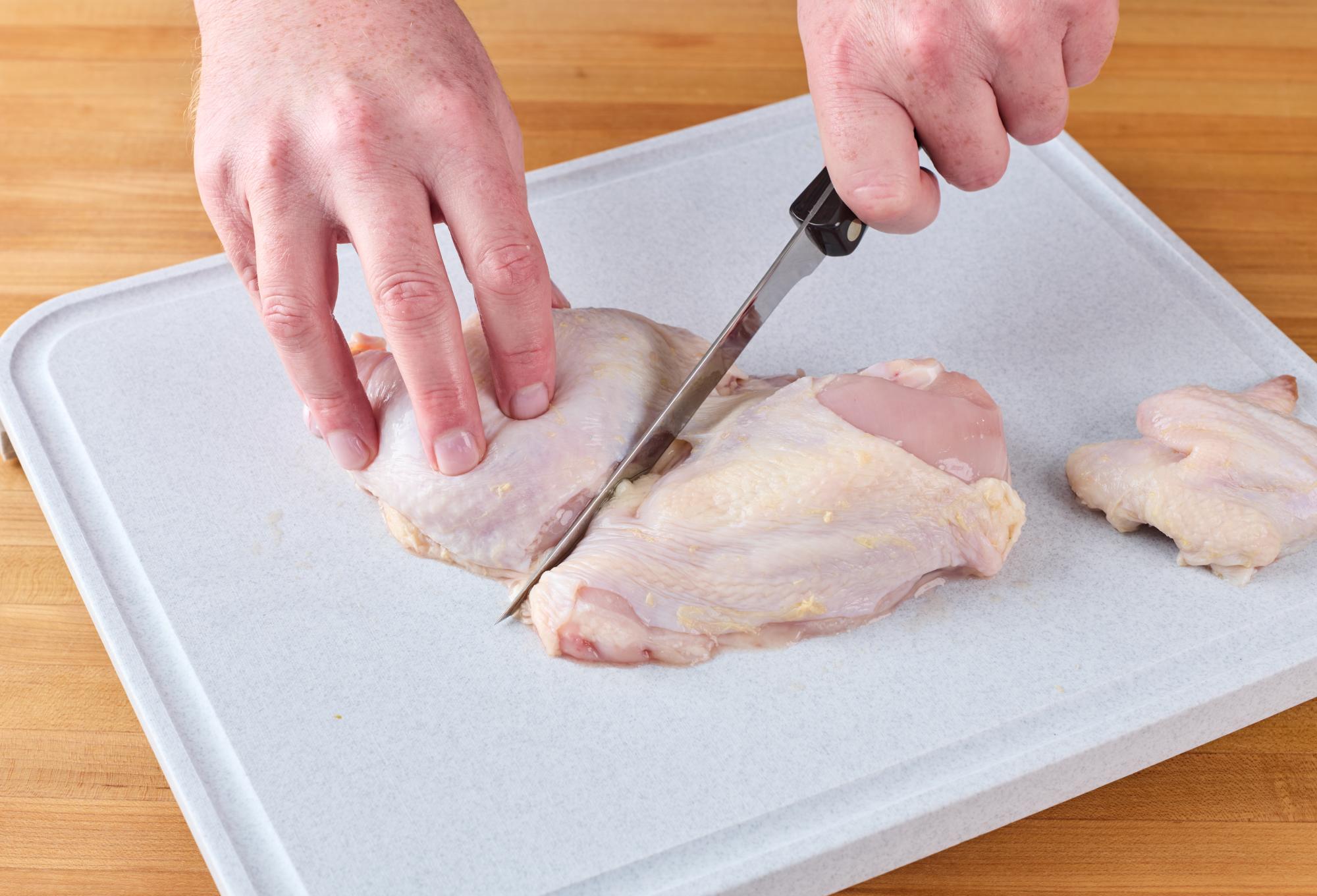 Cutting chicken with Boning Knife