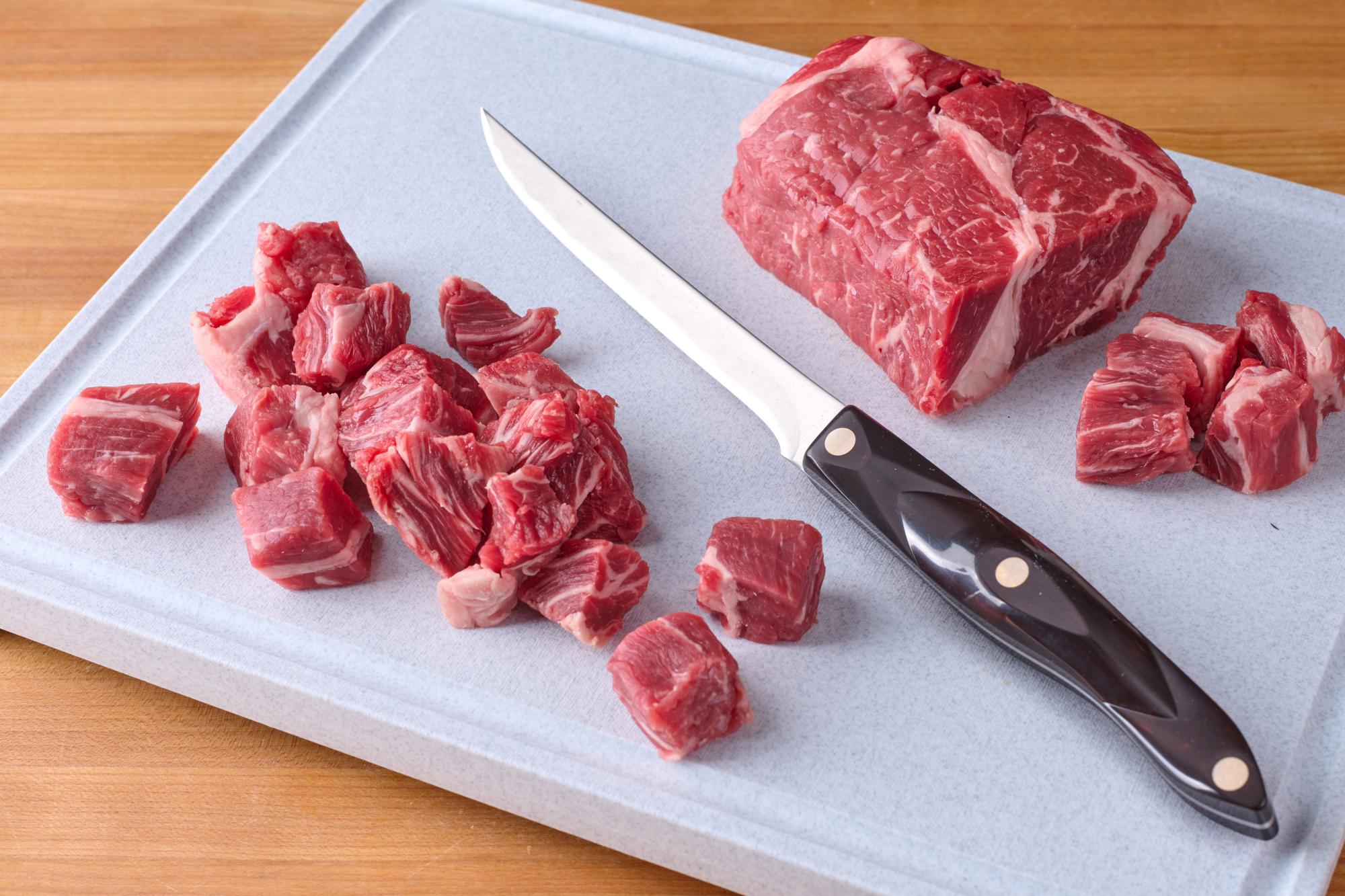 Chop the steak into bite-sized chunks.