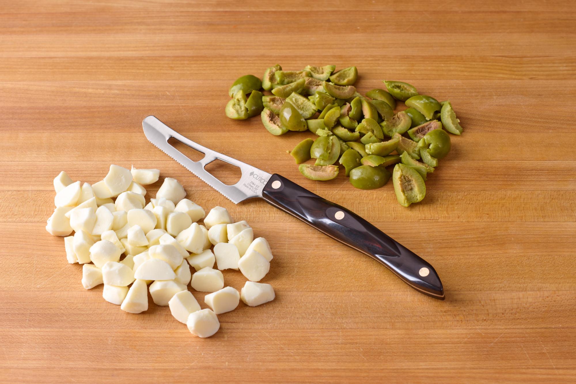 Halved or Quartered Castelvetrano olives and mozzarella balls with Mini Cheese Knife.