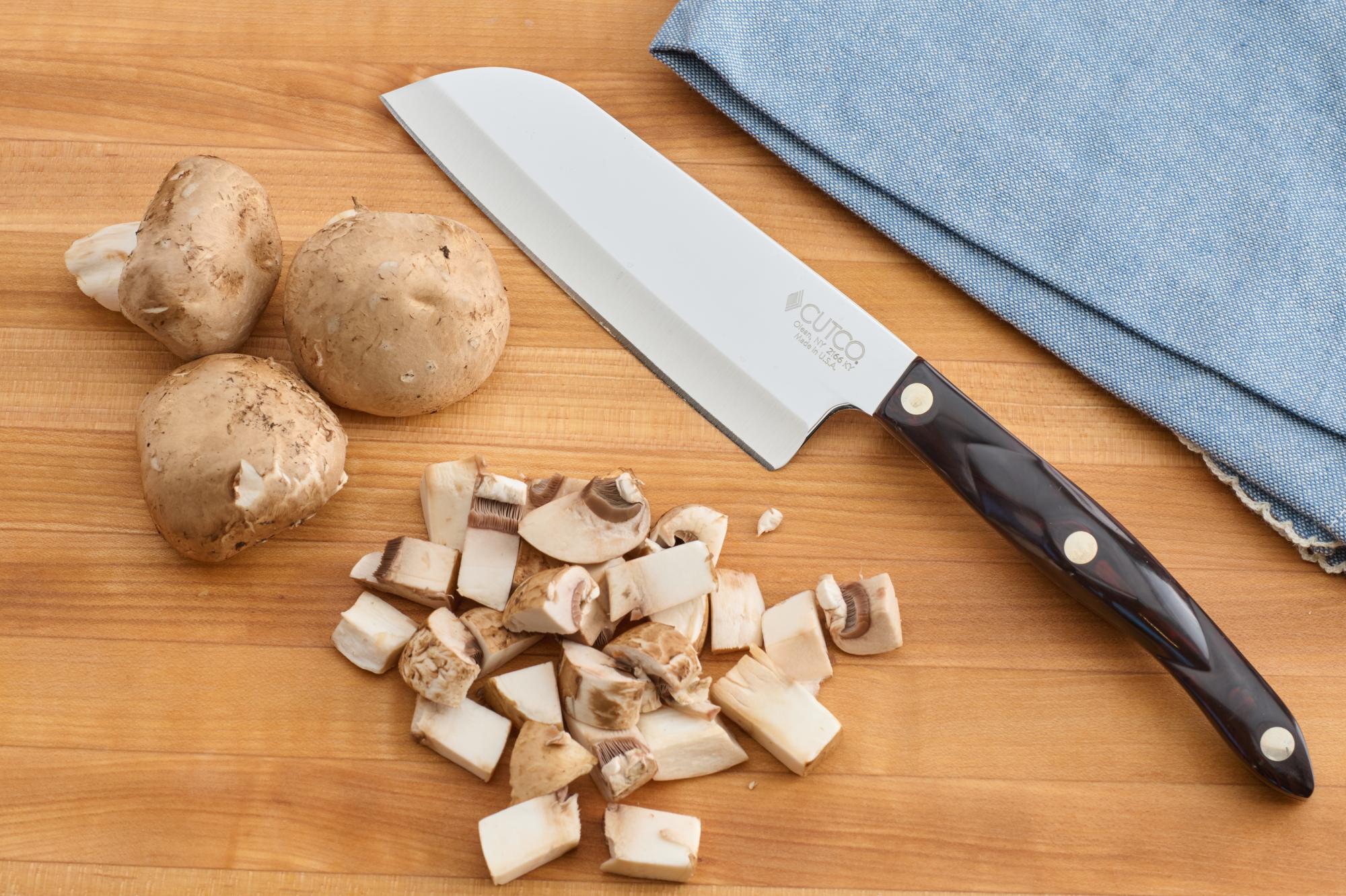 Diced mushrooms with a Petite Santoku.
