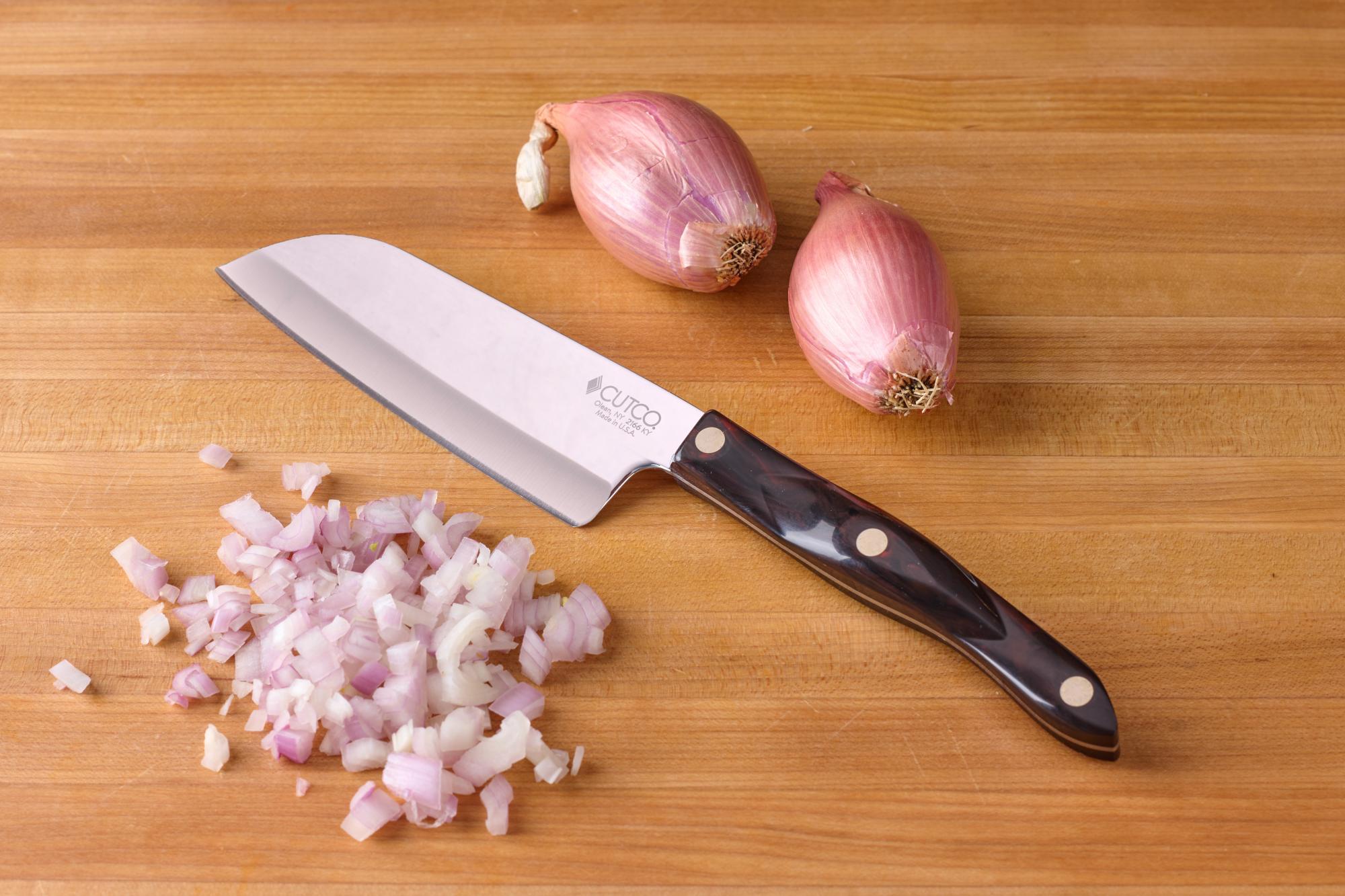 Finely chopped shallots with a Petite Santoku.