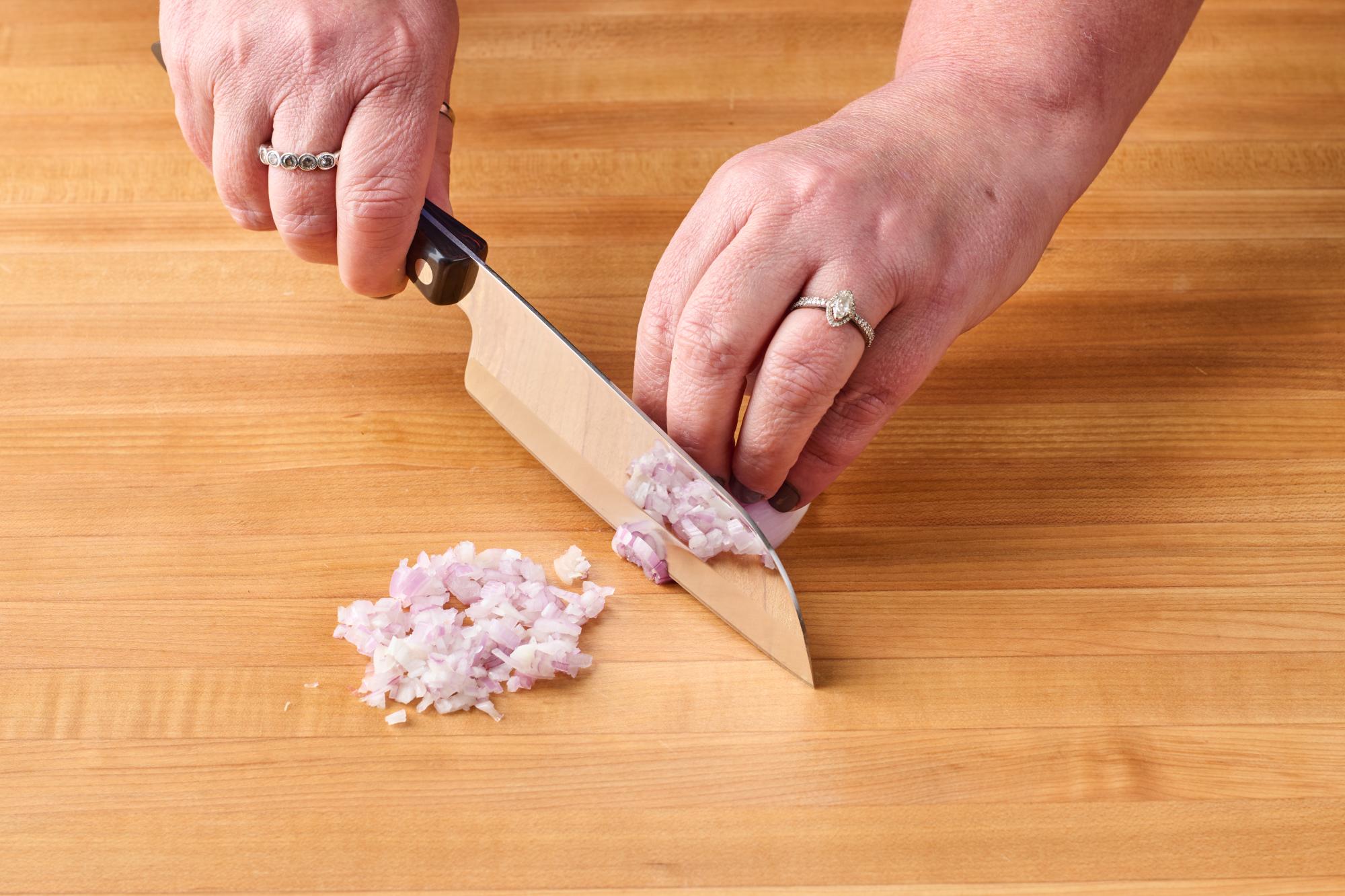 Minced shallot with a Petite Santoku.