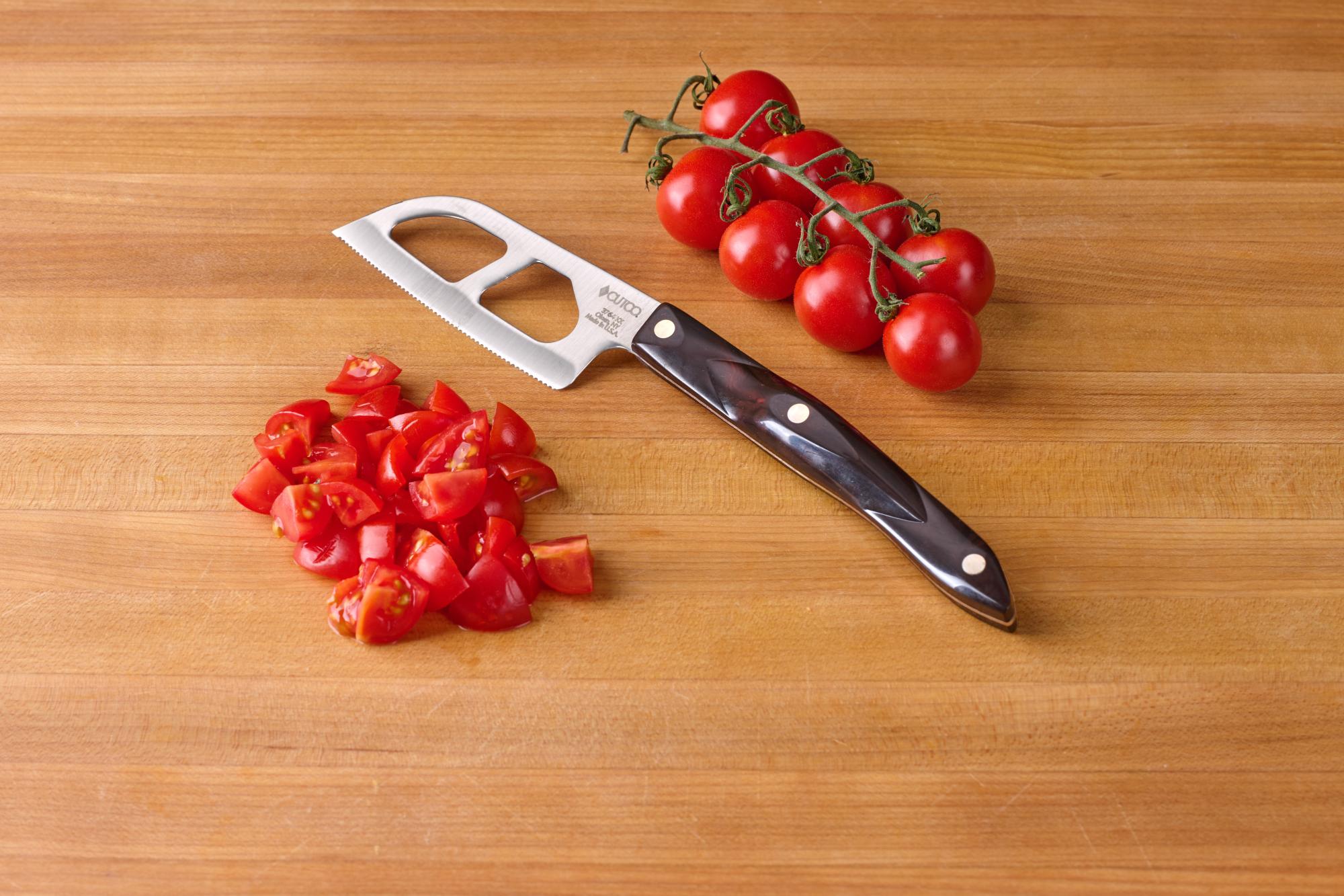 Chopping tomatoes with a Santoku-Style Cheese Knife.