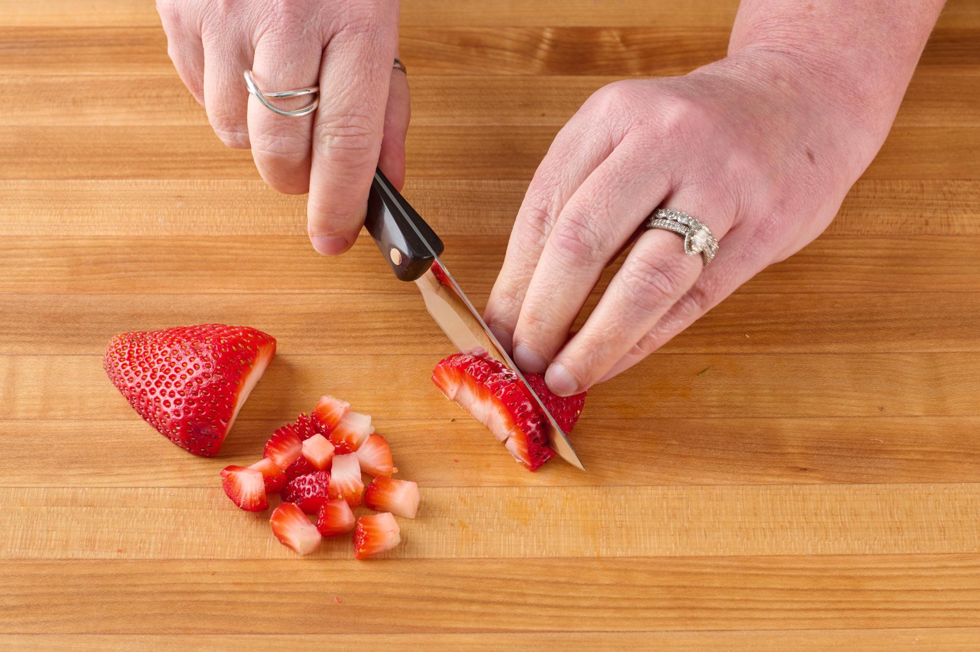 Hull the strawberries.