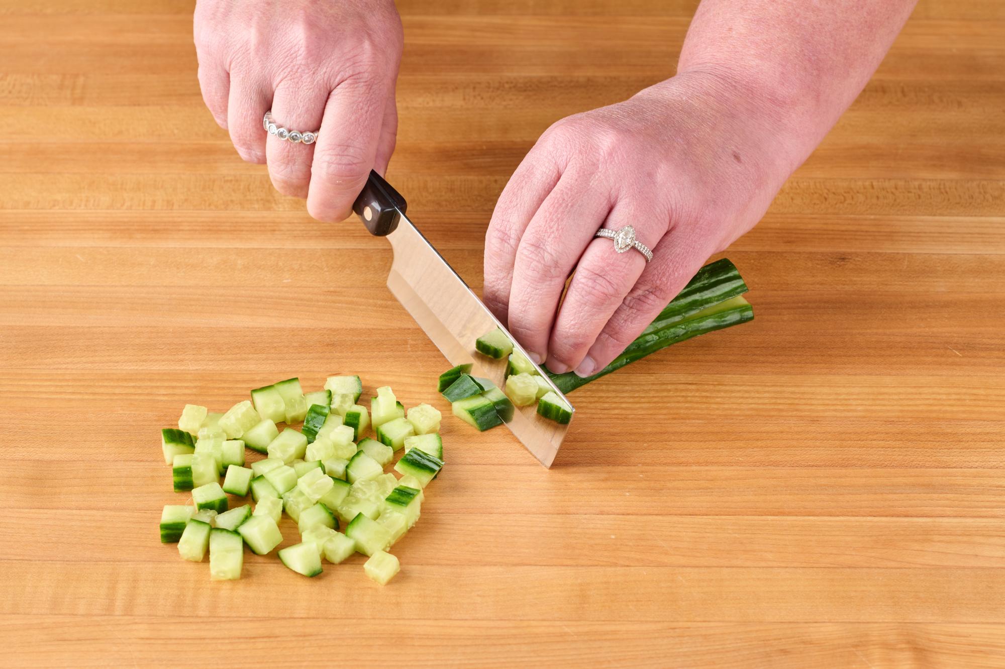 Dicing cucumber with a 4" Vegetable Knife.