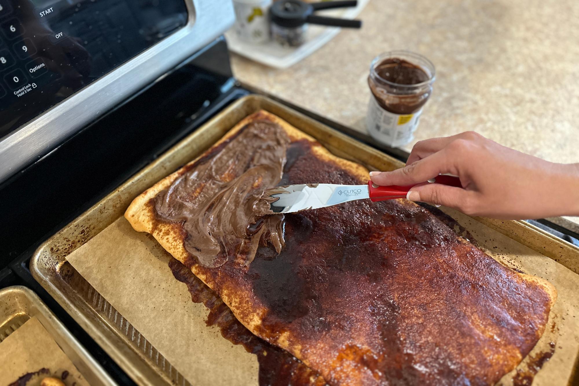 Spreading the hazelnut topping with Spatula Spreader.