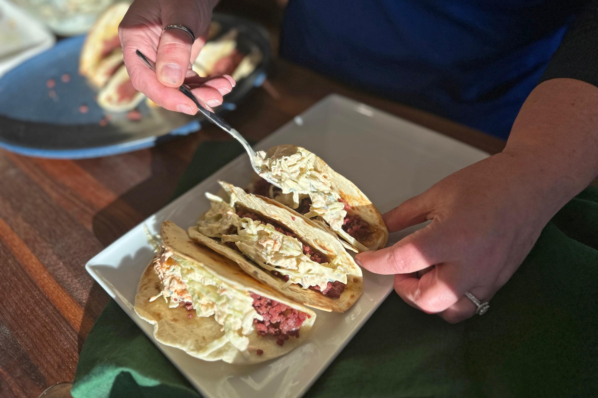 Fill the tortilla with the corned beef.