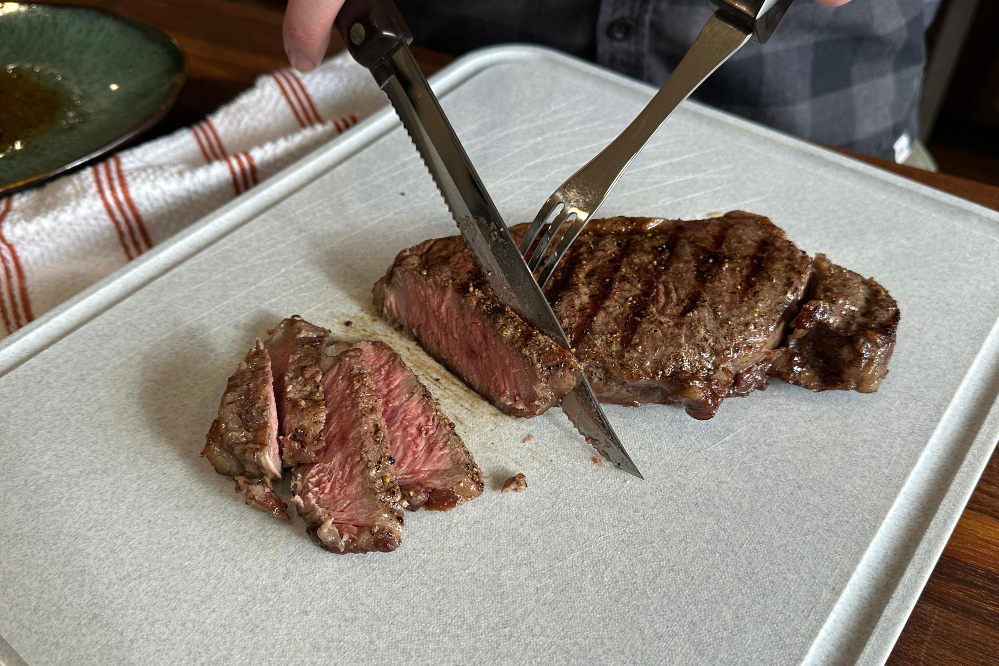 Thinly slice the steak against the grain.