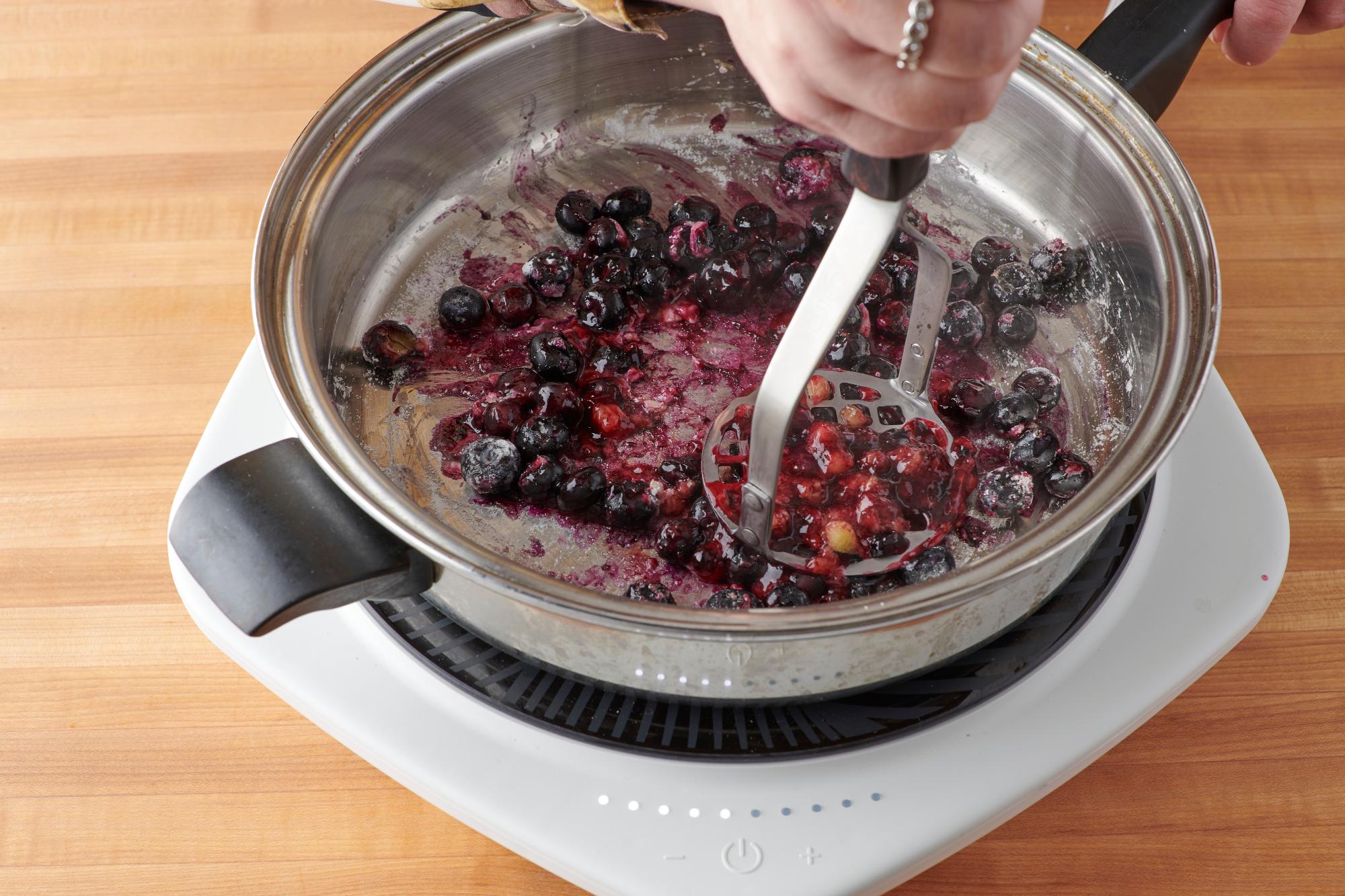mashing berries