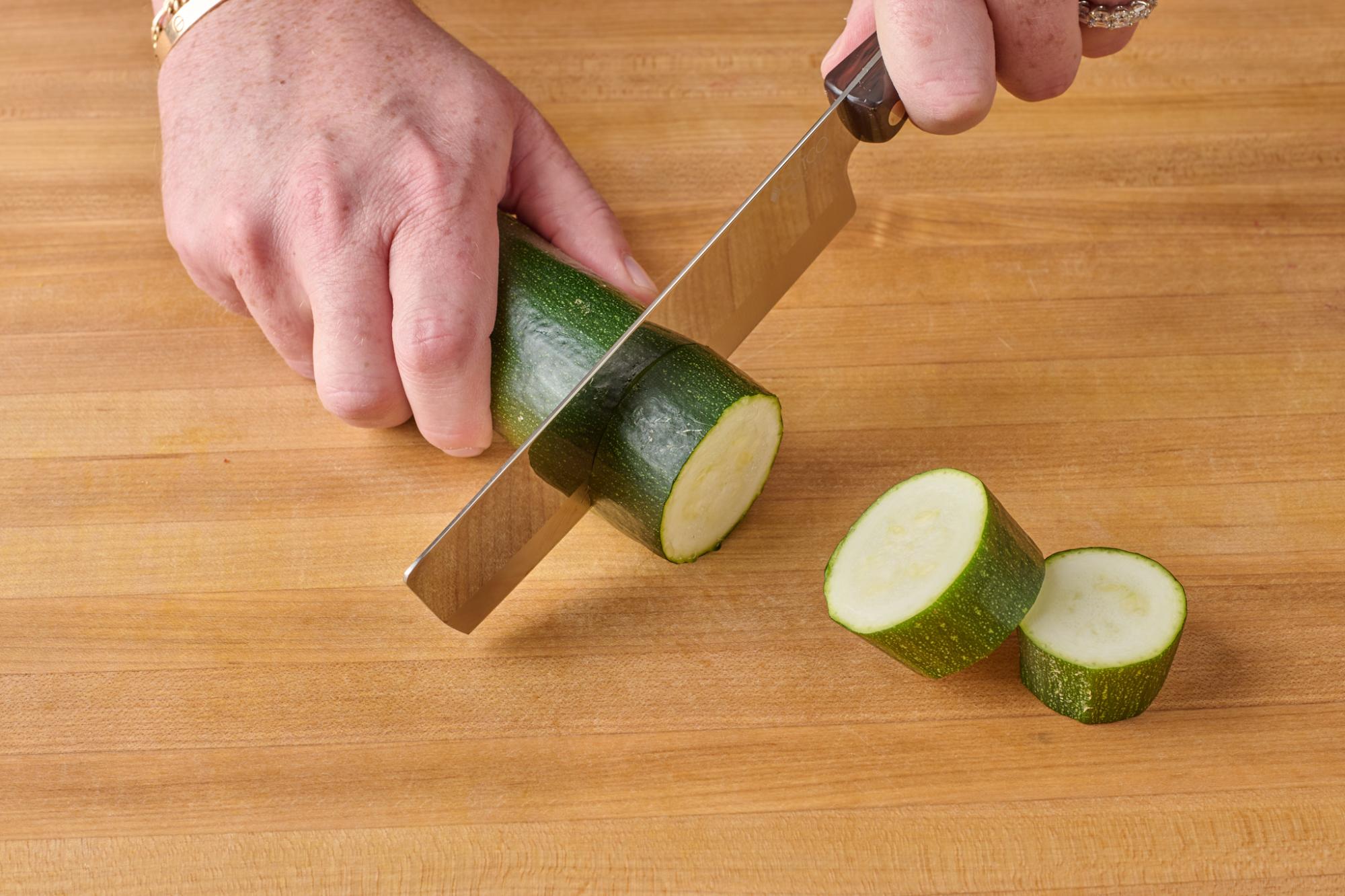 Slicing zucchini with 6″ Vegetable Knife