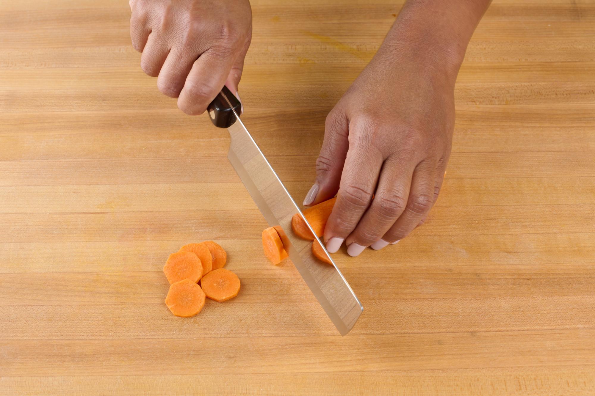 thinly slicing carrots