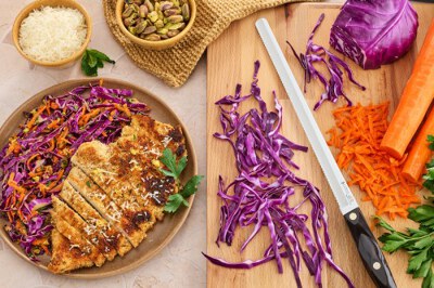 Chicken Cutlet Over Red Cabbage and Carrot Slaw