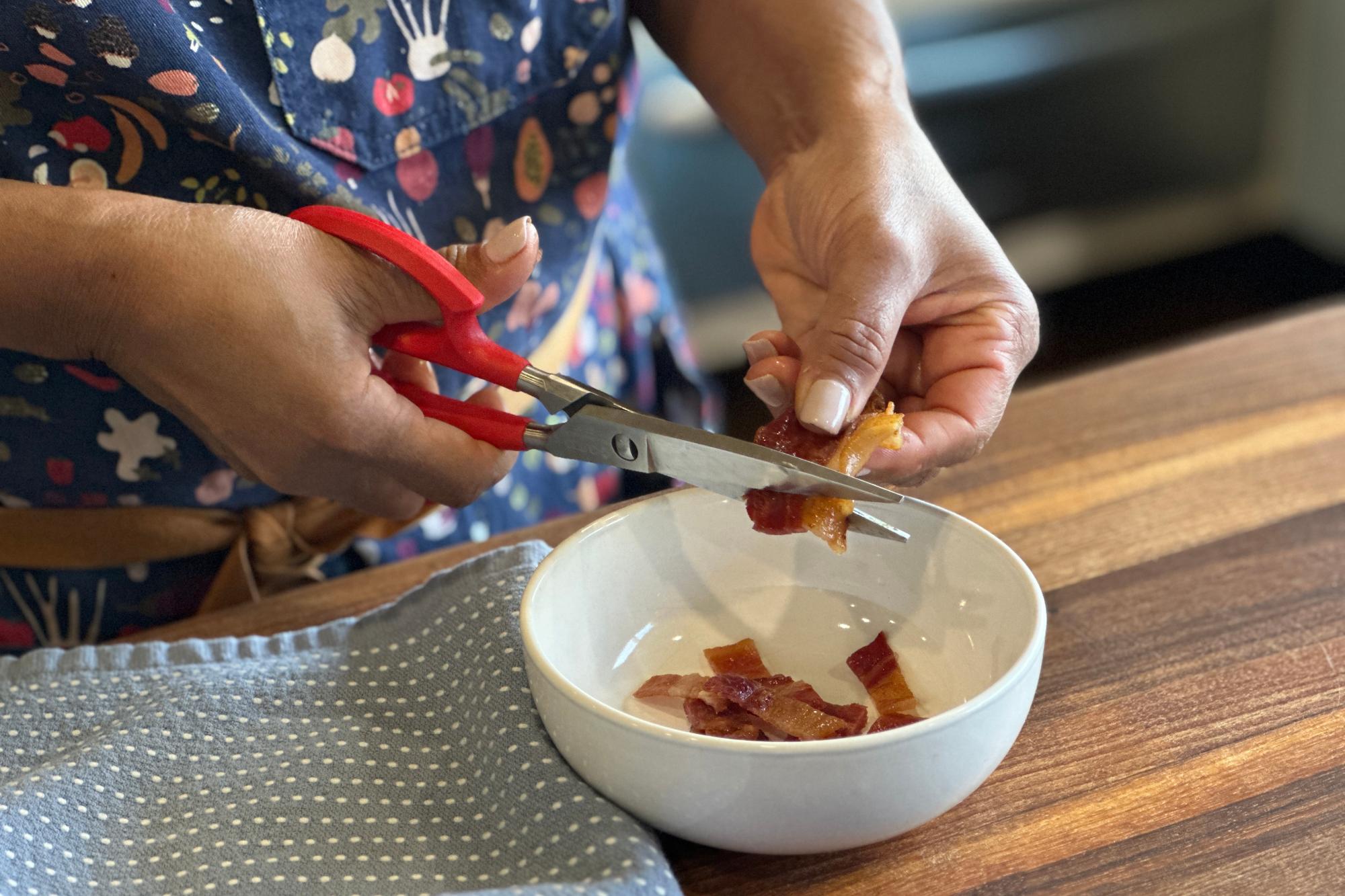 Use the Super Shears to cut the bacon into bite-sized pieces.