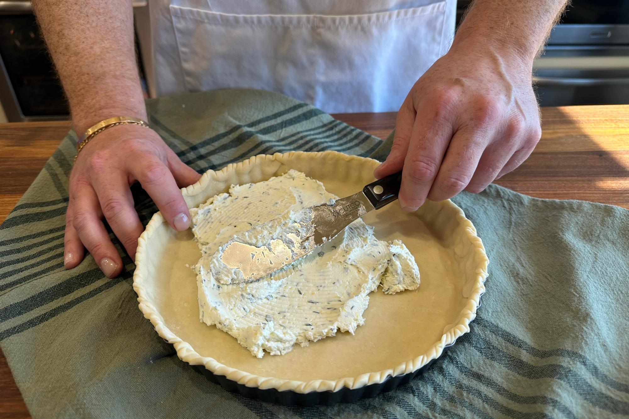 Spreading the cheese mixture onto tart with Spatula Spreader.