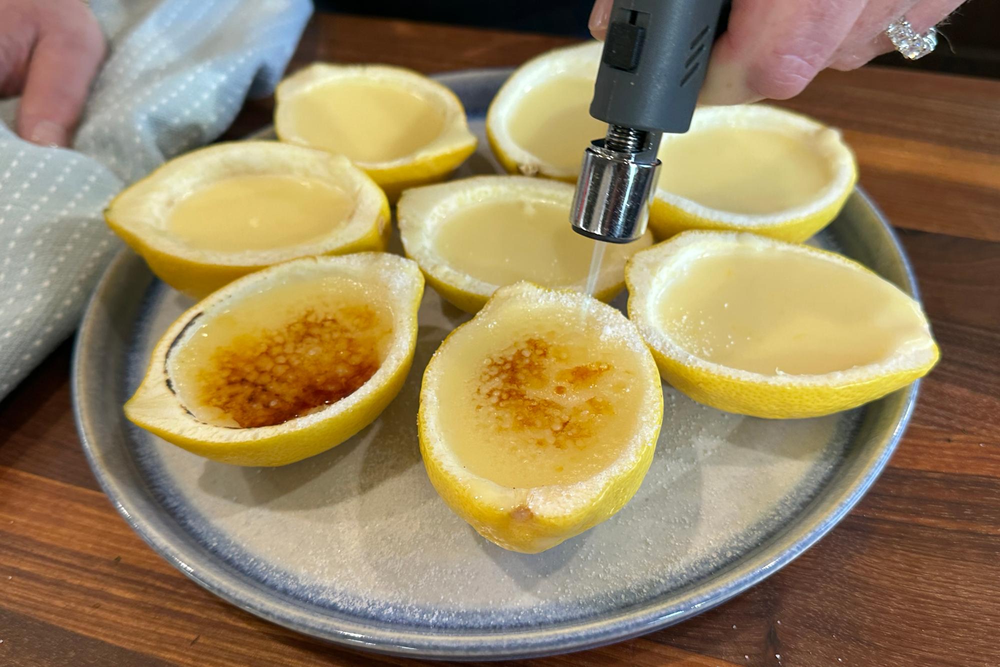 Browning the tops with blowtorch.
