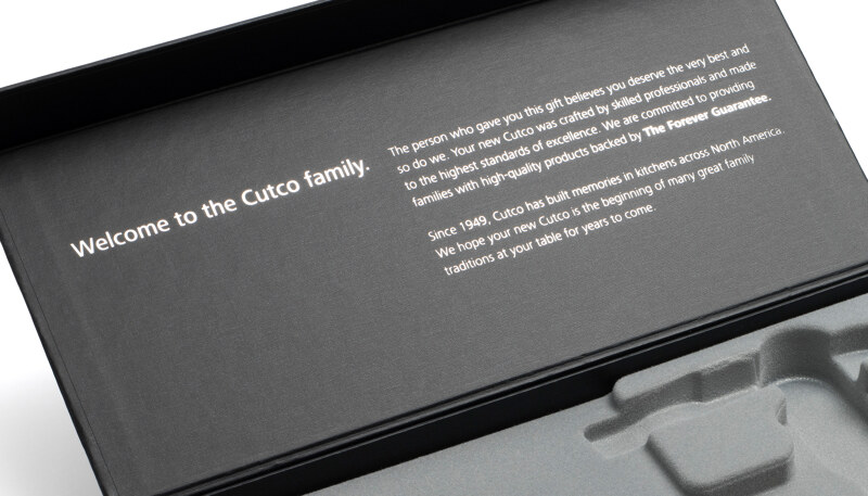 Closeup of inside of gift box lid and welcome message.
