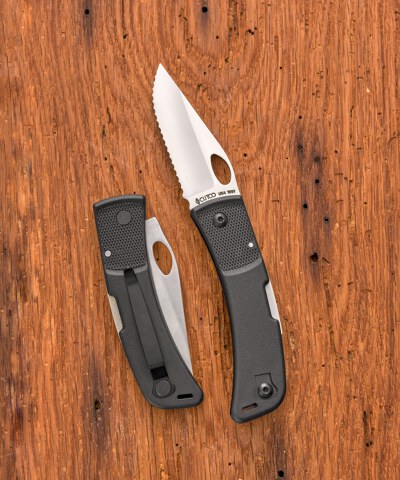  NEW Model 5721 CUTCO Fisherman's Solution with 6 - 9  adjustable Straight Edge blade and 5.4 handle. Pivoting sheath doubles as  a gripper; built-in, notched line cutter and sharpening stone. 