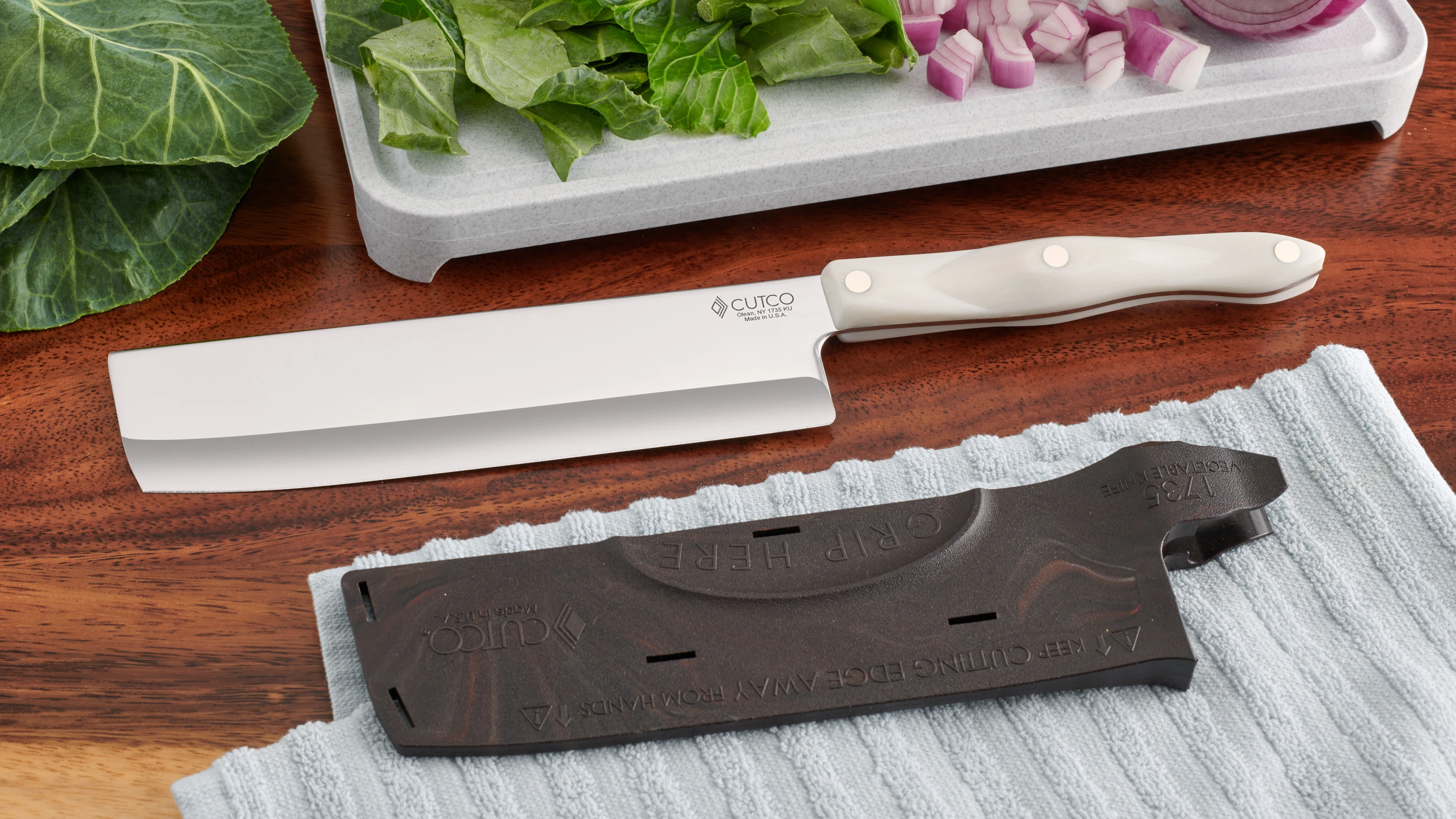  CUTCO Model 1735 Vegetable Knife7.7 x 2.0 High  Carbon Stainless Straight Edge blade and 5¾ Classic Brown (Black)  Handlein factory-sealed plastic bag: Vegetable Cleavers: Home &  Kitchen