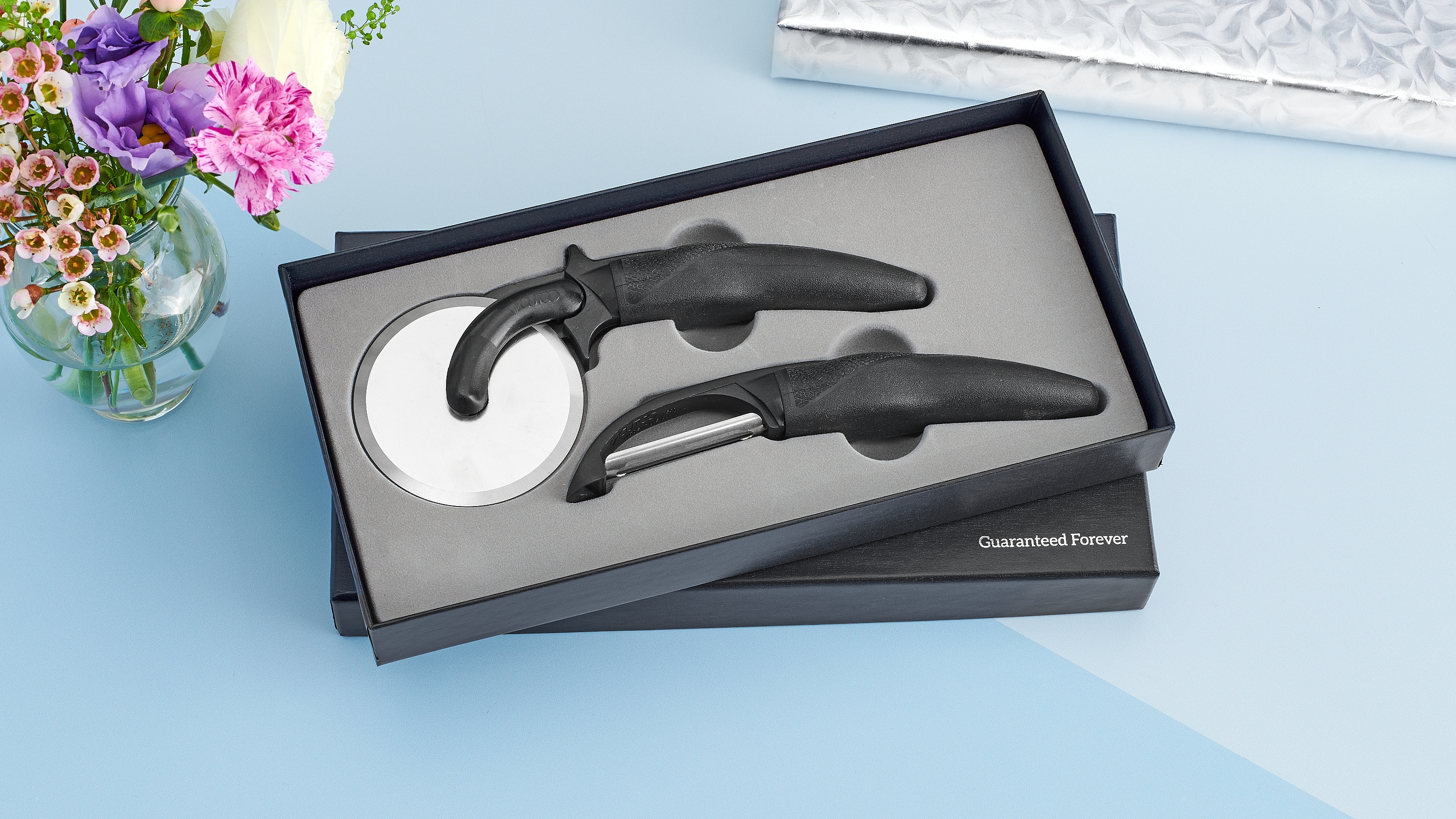 CUTCO Model 1838 Entertainer Set in special CUTCO gift box.   Includes 1501 Peeler, 1502 Pizza Cutter, 1503 Ice Cream Scoop, and 1504  Cheese