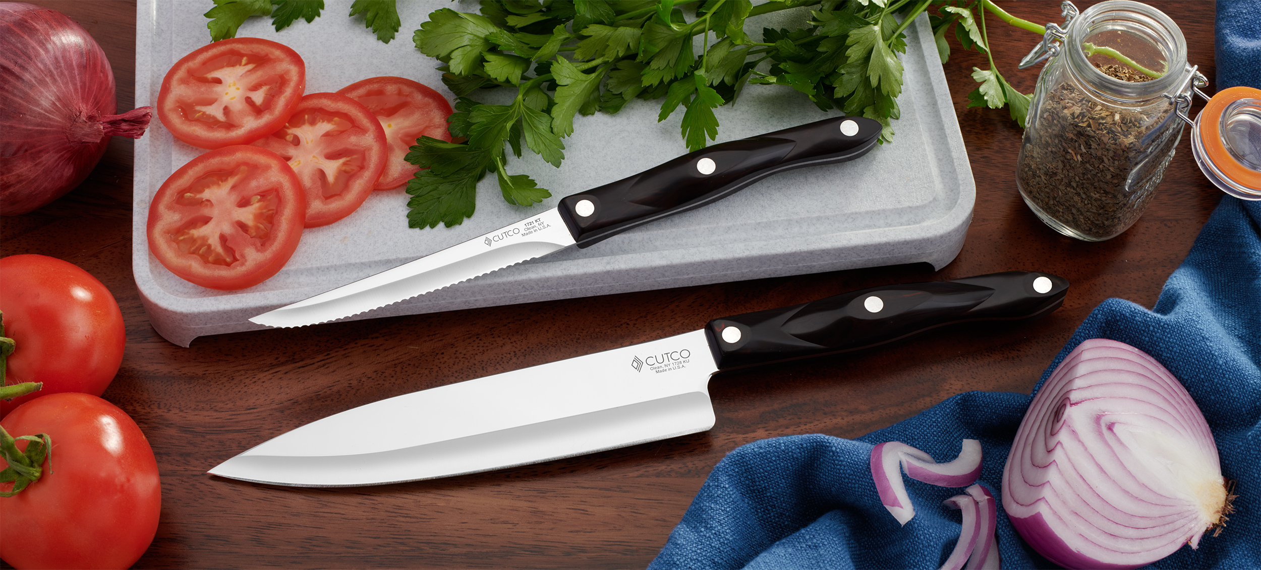 Cutco Knives with cut fruits and vegetables