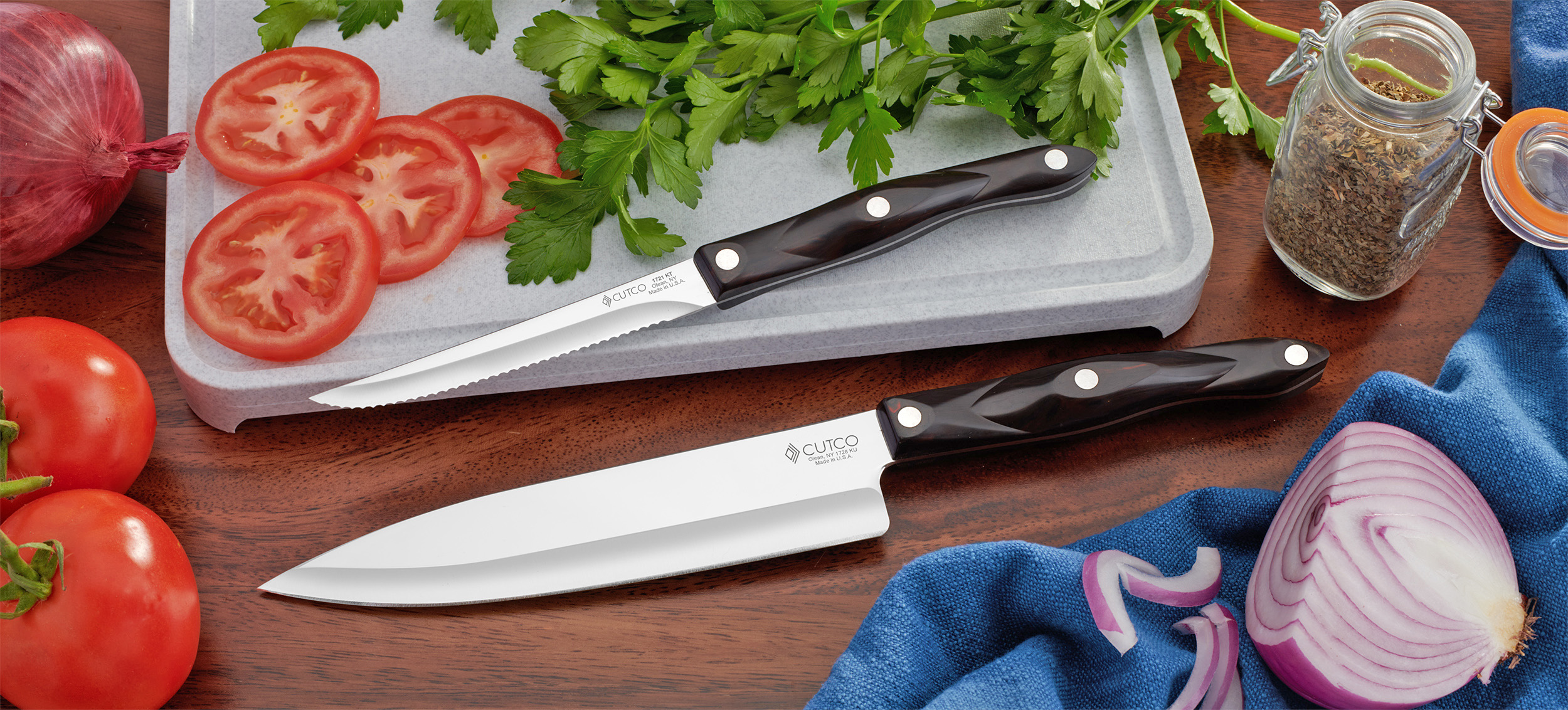 Cutco Knives with cut fruits and vegetables