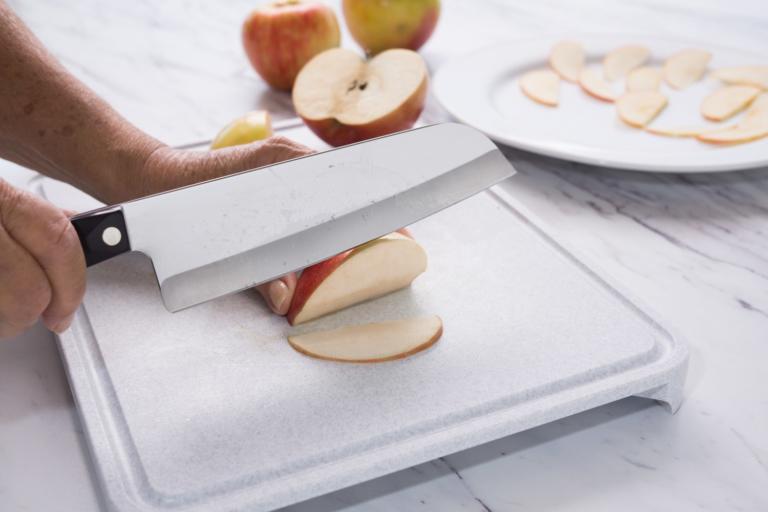 Slicing apples with a Santoku.