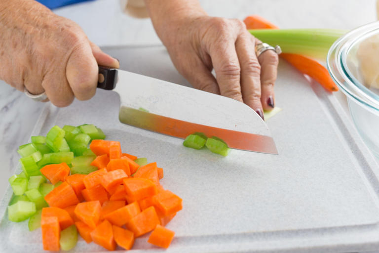 Dicing the celery with a Santoku.