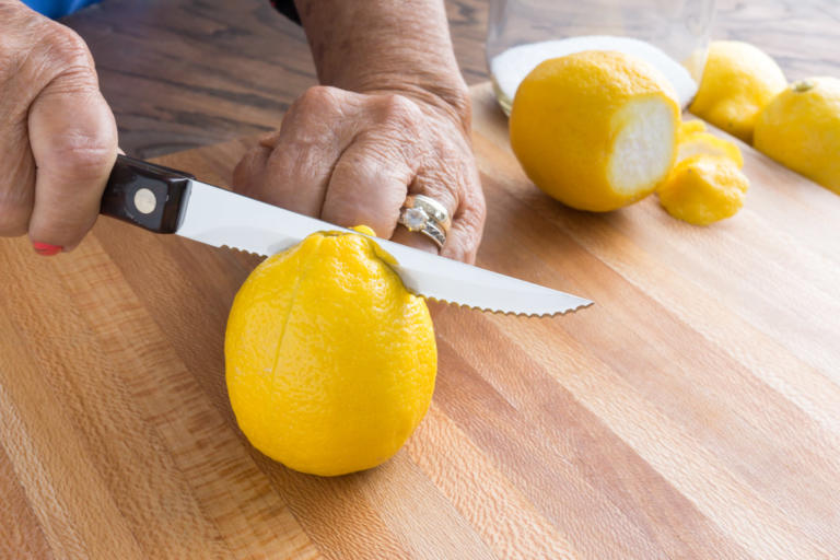 Using the Trimmer to cut the lemon.