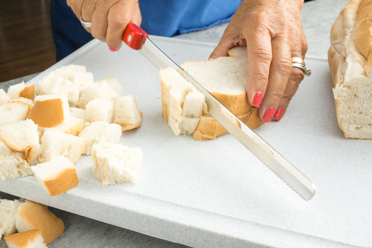 Slicing the bread with a Slicer.